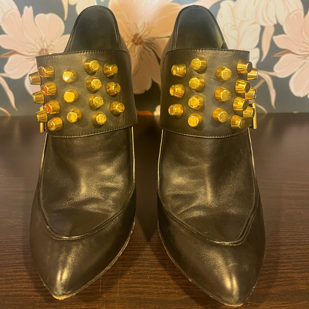 Gucci black leather ankle boots.